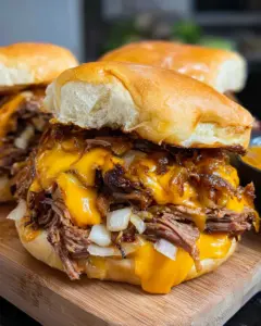 Crockpot Shredded Beef and Cheddar Sandwiches